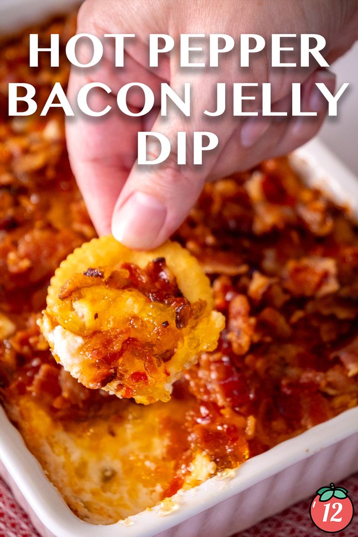 a person scooping some food out of a casserole dish with the words hot pepper bacon jelly dip above it