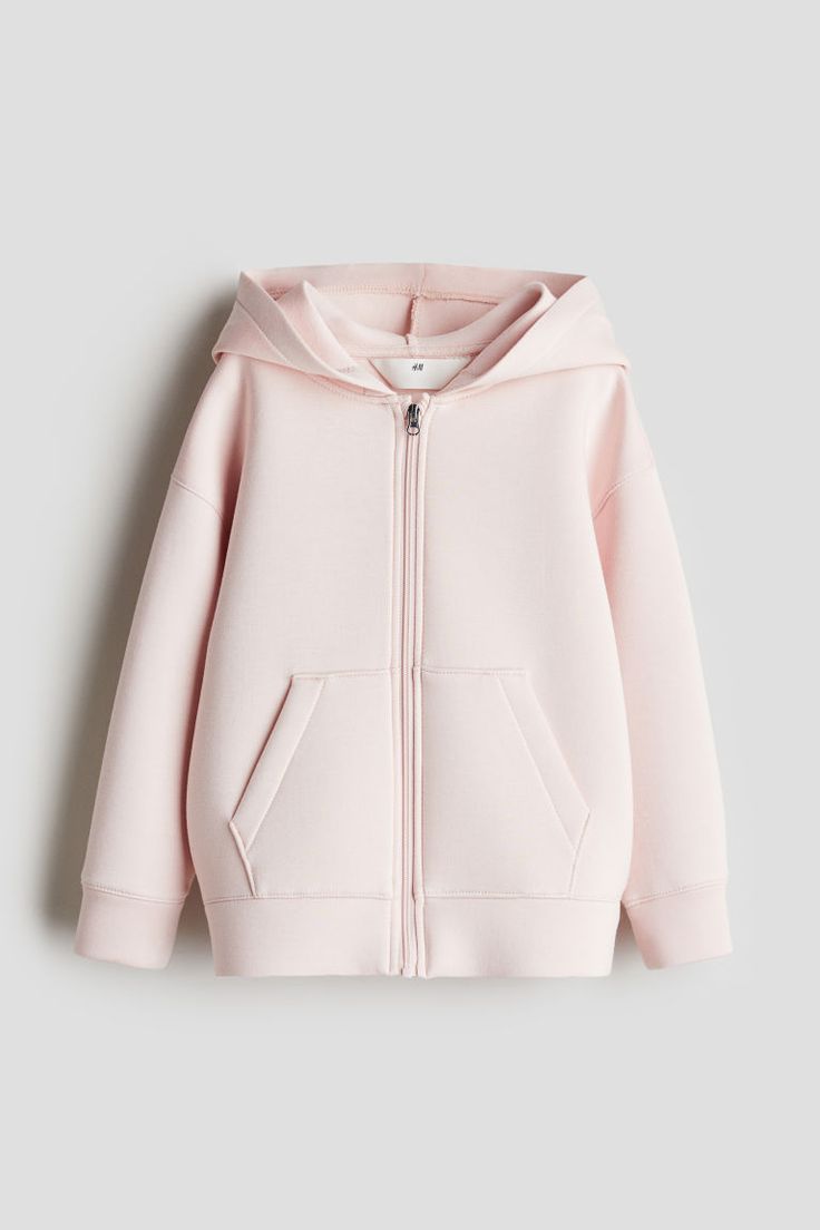 Hooded jacket in scuba fabric. Zipper at front  dropped shoulders  front pockets  and cuffed sleeves. Gifts For Everyday Use, Light Pink Zip Up Hoodie, Cute Winter Hoodies, Pink Zip Up, Baby Pink Jacket, Cute Kawaii Clothes, Light Pink Jacket, Cute Winter Coats, Light Pink Hoodie