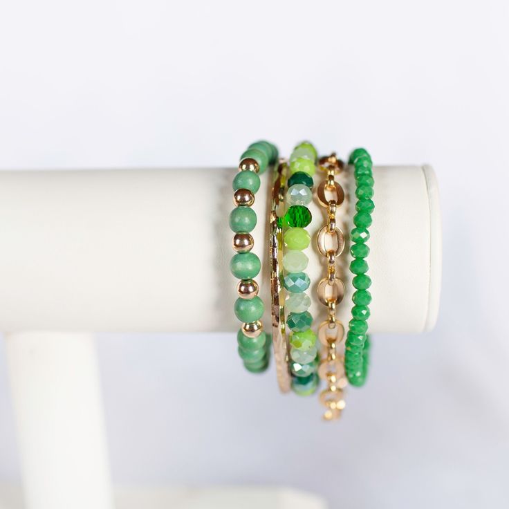 Consists of 5 bracelets "Turn your green dreams into reality with our Green Come True Bracelet Stack. This stack features a stunning shade of green, adding a pop of color to any outfit. Get ready to make a statement and stand out from the crowd. Gold cuff- (one size…if require smaller or larger contact us first so we can suggest an alternate bracelet) Roma Chain Bracelet (one size…if require smaller or larger contact us first so we can suggest an alternate bracelet) (60000303) Dark Emerald Facet Stacked Earrings, Dreams Into Reality, Gold Cuffs, Rose Earrings, Rose Gold Necklace, Rose Gold Earrings, Bracelet Stack, Shades Of Green, Chain Bracelet