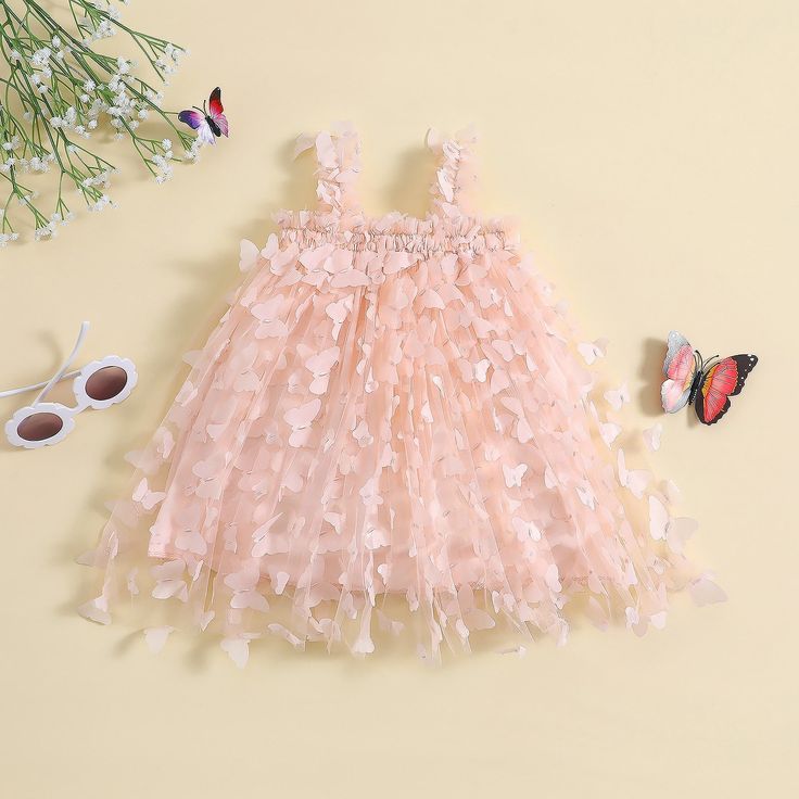 This stunningly simple tulle dress is adorned with 3D-stitched butterflies that will have your little one feeling like a fairy as she flutters around in her own magic. Playful Tulle Tutu Dress For Summer, Summer Princess Fairy Dress In Tulle, Summer Princess Style Tulle Fairy Dress, Summer Princess Tulle Fairy Dress, Sleeveless Fairy Dress For Dress-up In Summer, Playful Fairy Dress For Spring Party, Playful Spring Fairy Dress For Party, Playful Fairy Dress For Dress-up In Summer, Spring Tulle Fairy Dress For Garden Party