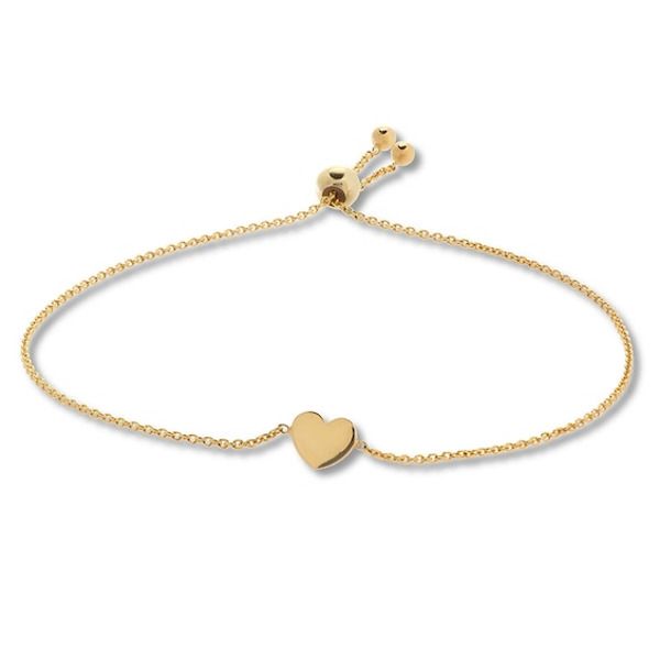 This charming bolo bracelet for her features a 14K yellow gold heart. The bracelet adjusts with the sliding bolo clasp. Cushion Halo Engagement Ring, Bracelet For Her, Simple Hoop Earrings, Bolo Bracelet, Jewelry Advice, Kay Jewelers, Gold Bracelets, Gold Light, Bar Bracelets