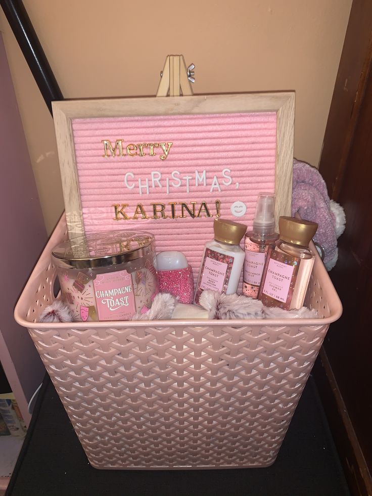 a pink basket filled with lots of items