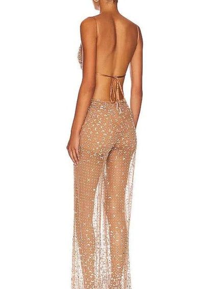 Make a statement in our Sequin Jumpsuit in Nude! This daring and daringly stylish jumpsuit features an all-over sequin design that sparkles and shines with every move, perfect for those who love to take risks and stand out from the crowd. Embrace the adventure and be the star of any event! Self: 100% nylon Lining: 95% Crystal Jumpsuit, Stylish Jumpsuit, Sequin Jumpsuit, Jumpsuit Elegant, Sequin Design, Side Cuts, Take Risks, The Star, Sequin