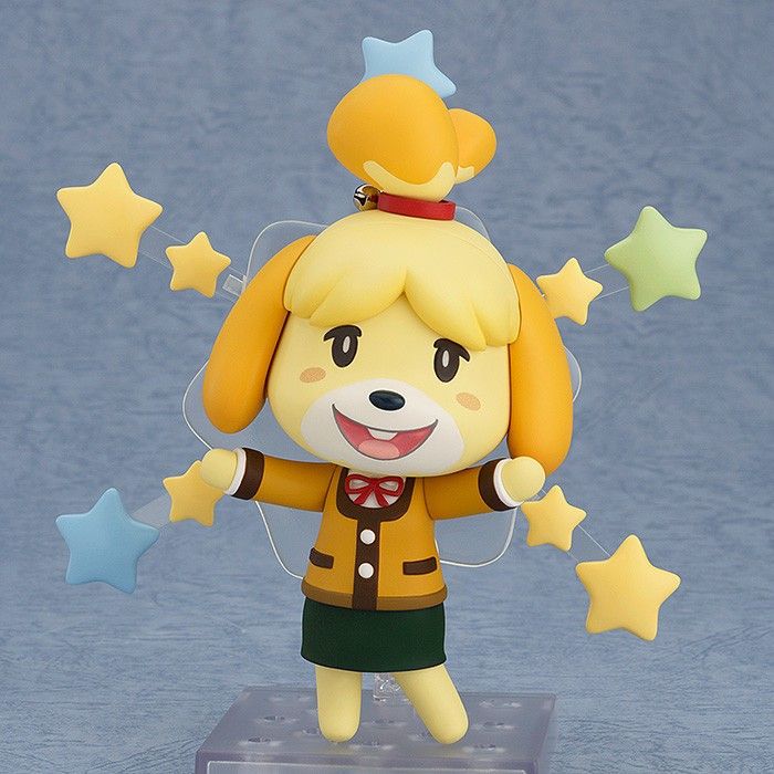 a small toy doll with stars on it's head and arms in the shape of a dog