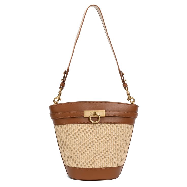 The timeless and trend-setting design of the Madison Bucket Bag is a must-have. It can be worn by its adjustable, removable shoulder strap or elegantly draped over your shoulder with an alternative woven strap. With its spacious interior, it's a wardrobe staple for your everyday adventures. Elegant Woven Leather Satchel Bag, Elegant Bags With Woven Leather And Double Handle, Modern Leather Bucket Straw Bag, Modern Leather Straw Bucket Bag, Chic Woven Leather Straw Bag With Top Handle, Chic Satchel With Gold-tone Hardware Bucket Shape, Elegant Summer Shoulder Bag With Leather Handles, Summer Leather Hobo Bag With Detachable Handle, Elegant Woven Leather Bucket Bag For Travel