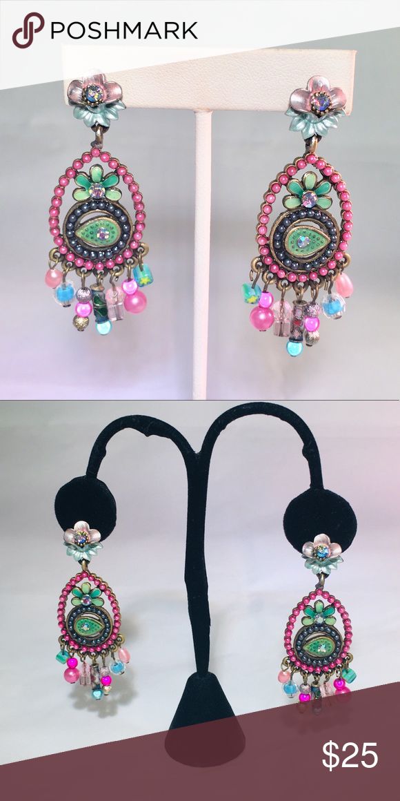 Artsy Earrings Artsy colorful detailed enamel flowers beads dangling well crafted boutique earrings. These pretty earrings measures 2.5 inches long and 1 in wide.  NWOT Jewelry Earrings Pink Dangle Clip-on Jewelry, Pink Clip-on Dangle Jewelry, Pink Teardrop Jewelry For Festivals, Whimsical Pink Dangle Earrings, Pink Clip-on Drop Earrings, Pink Teardrop Festival Earrings, Pink Teardrop Earrings For Festival, Pink Bohemian Crystal Earrings For Pierced Ears, Bohemian Pink Crystal Earrings For Pierced Ears