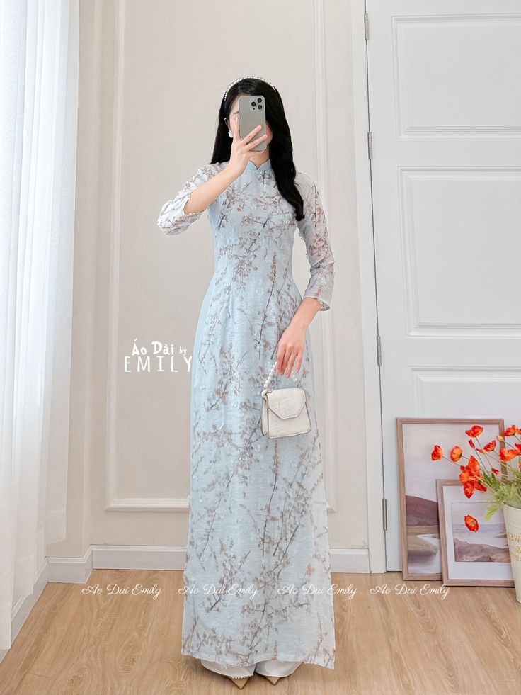 🌻This listing is for 1 long dress Pre-made ao dai (Vietnamese long dress) for women/girls. Material: Double layers voan/silk - Stretchy level : 0/10 🌻 The measurement of this ao dai (long dress) is in Vietnamese size (American size tends to be bigger for the same size). Please LOOK AT THE SIZE CHART CAREFULLY BEFORE ORDERING. There might have some chalk writings on the fabric due to making process. These marks can be washed away easily. 🌻🌻No returns or exchanges Buyer can contact seller about any issues with an order. 🌸 Follow us Facebook/aodaiemily www.aodaiemily.com 💜 Thank you very much!💜 Elegant Ao Dai With Stand Collar For Spring, Spring Wedding Dress With Stand Collar, Light Blue Long Dresses For Spring, Long Light Blue Spring Dress, Summer Wedding Ao Dai With Stand Collar, Fitted Ao Dai With Floral Print For Spring, Elegant Full Length Ao Dai For Spring, Fitted Ao Dai For Spring Wedding, Elegant Ao Dai With Floral Embroidery For Spring