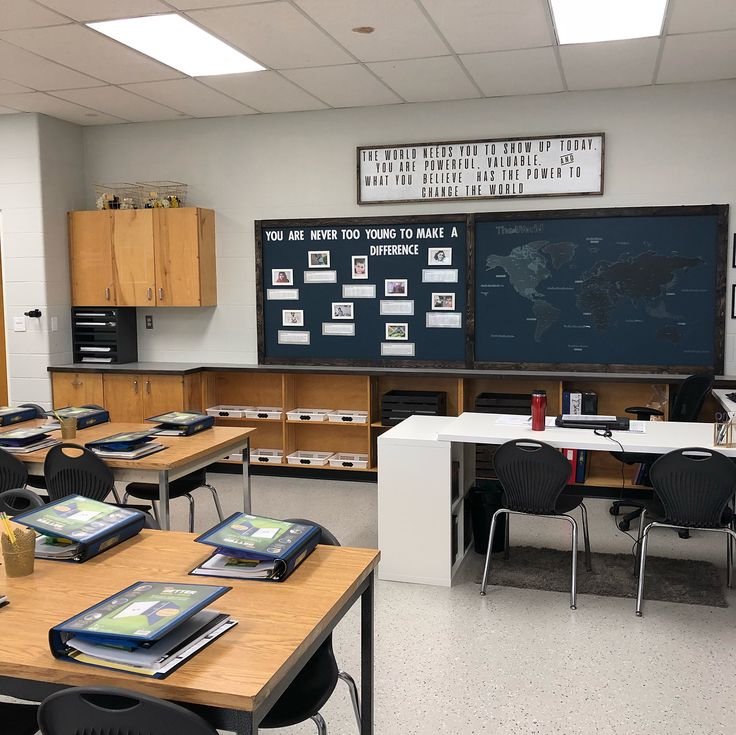 an empty classroom with desks and chairs