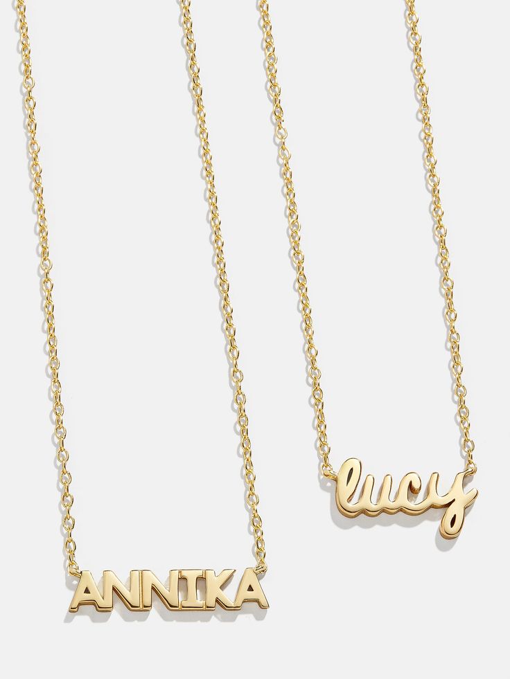 Spell it out with the 18K Gold Mini Nameplate Necklace. This custom name piece features a modern gold chain attached to your choice of a pavé or gold nameplate. Featuring the personalization of your choosing. Crafted with 18K gold plated sterling silver and Cubic Zirconia stones, you'll be wearing it for years to come. Customized Yellow Gold Nameplate Necklace, Luxury Gold Nameplate Necklace, Luxury Gold Custom Name Necklace, Yellow Gold Nameplate Necklace With Names, Yellow Gold Nameplate Necklace, Custom Yellow Gold Nameplate Necklace With Names, Luxury Personalized Initial Pendant Name Necklace, Customizable Yellow Gold Nameplate Necklace, Luxury Yellow Gold Name Necklace For Personalized Gift