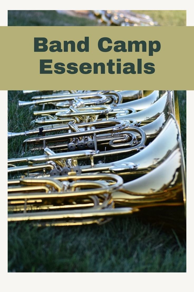 the words band camp essentials are in front of an image of brass instruments on grass