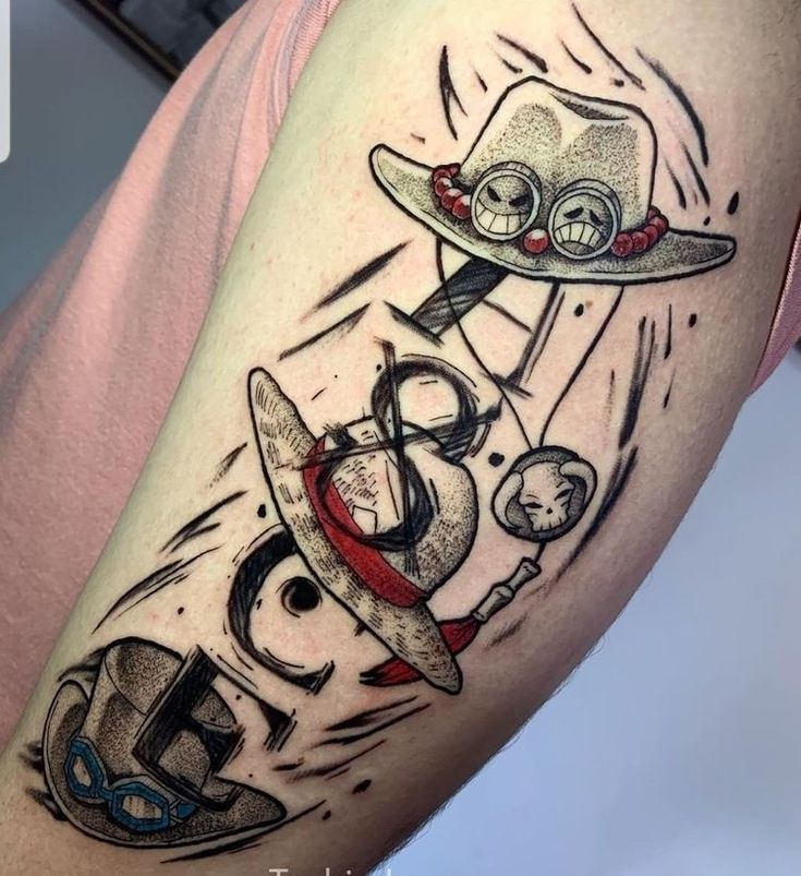 a man with a tattoo on his arm that has an image of two cartoon characters