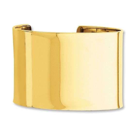 Make a statement every time you wear it - this 14K yellow gold cuff bracelet commands attention. The cuff is 47mm in width and has a high-polish finish. Modern Yellow Gold Polished Cuff Bracelet, Modern Yellow Gold Cuff Bracelet With Shiny Finish, Modern Shiny Yellow Gold Cuff Bracelet, Modern Yellow Gold Wide Band Bracelet, Modern Thick Band Bangle For Formal Occasions, Luxury Open Band Bracelet For Formal Occasions, Luxury Open Band Bracelets For Formal Occasions, Gold-tone Bangle With Polished Finish For Formal Occasions, Yellow Gold Polished Cuff Bracelet