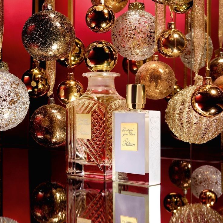 an assortment of christmas ornaments and perfume bottles