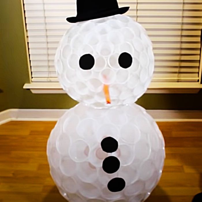 a snowman made out of plastic cups