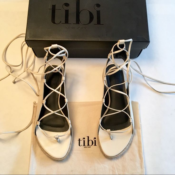 Leather And Soles In Perfect Condition. No Flaws. Worn Once To An Inside Event. So Much Wear Left In These Beauties. Purchased At Shop Bop For $425 Slender Cords Lace Across The Top And Wrap The Ankle On These Tibi Gladiator Sandals. Open Heel And Toe. Rubber Heel Patch At Leather Sole. Ships In All Original Packaging. No Trades. Cord Lace, Corded Lace, Open Toed Heels, Rubber Heels, Lace Up Flat, Chanel Ballet Flats, Gladiator Sandals, Cream White, Women's Shoes Sandals