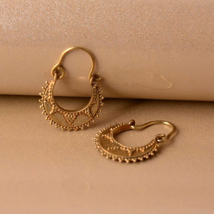 Boho Tribal Hoop Earrings; Ethnic, Mandala minimalist Creoles, huggie curls, gold creoles, women's gift, boho rings, boho earrings Material :- Brass ❥ Add this beautiful one little thing of galactic shine to make you feel unique and to transform your lives. Perfect for any kind of outfit and every occasion. ❥ Customers satisfaction is our biggest priority, please contact us with any questions/queries for future or existing orders, and we will do our best to make sure you are happy with your orde Festive Small Hoop Earrings For Pierced Ears, Festive Brass Hoop Earrings With Ear Wire, Bohemian Yellow Gold Small Hoop Earrings, Bohemian Small Hoop Yellow Gold Earrings, Traditional Small Huggie Earrings As A Gift, Traditional Small Hoop Huggie Earrings For Gifts, Handmade Gold Cartilage Earrings, Bohemian Yellow Gold Jewelry For Festive Occasions, Handmade Gold Metal Cartilage Earrings