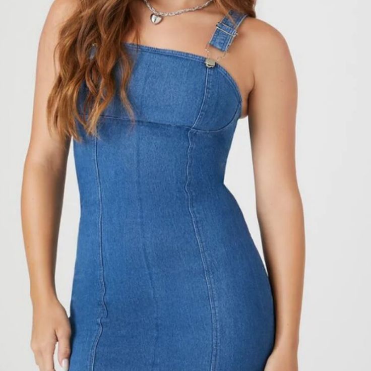 Crafted From Stretch Denim, This Mini Dress Features A Square-Cut Neckline And Back, Adjustable Shoulder Straps With High-Polish Hardware, Concealed Back Zipper Closure, And Bodycon Silhouette. Size Small - This Is An Independent Brand And Not A Forever 21 Branded Item. Content + Care - 72% Cotton, 26% Polyester, 2% Spandex - Machine Wash Cold Trendy Denim Dress By Forever 21, Forever 21 Trendy Denim Dress, Trendy Fitted Denim Dress From Forever 21, Trendy Fitted Denim Dress By Forever 21, Trendy Fitted Forever 21 Denim Dress, Trendy Forever 21 Denim Dress, Fitted Medium Wash Denim Dress By Forever 21, Forever 21 Fitted Medium Wash Denim Dress, Forever 21 Summer Medium Wash Denim Dress