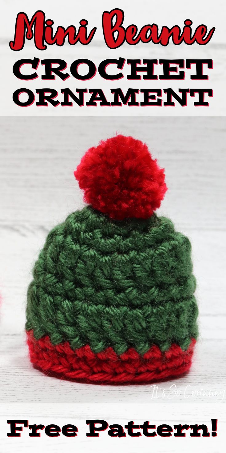 a crocheted hat with a red pom - pom on top and the words, mini beanie crochet ornament free pattern