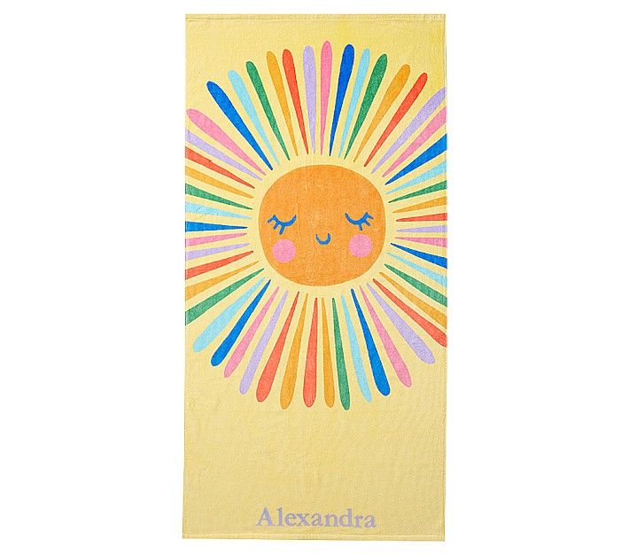 a towel with an image of a sun on the front and rainbows on the back