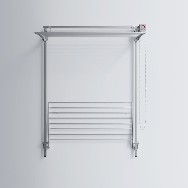 a white wall mounted towel rack with an electric heating element attached to the back of it