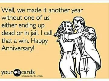 two people hugging each other with the caption saying well, we made it another year without one of us either ending up dead on in fall i call that win happy anniversary