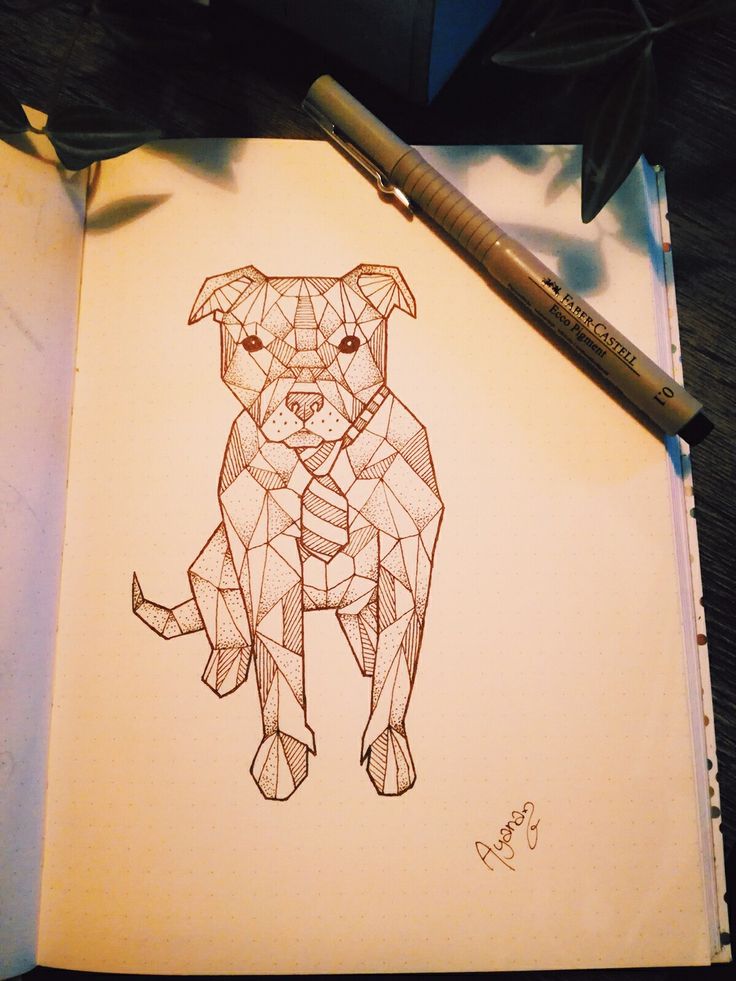 a drawing of a dog with geometric shapes on it's face and neck, sitting next to a pen