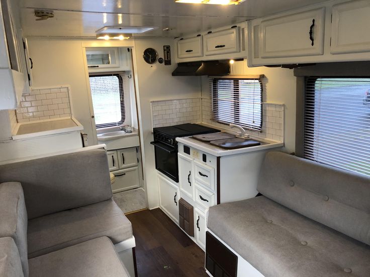 a kitchen and living room in an rv