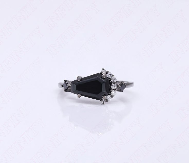 Ring Specifications & Details: Engagement/Wedding/Bridal Ring Stone Size: 10.00X7.00 mm Accents: Black Spinal Gemstone Stone Type: Black Onyx Gemstone Stone: Coffin Shape Natural Black Onyx Gemstone Metal Used: 925 Sterling Silver For Matching Necklace visit: https://www.etsy.com/uk/listing/1557979504/sterling-silver-black-rhodium-coffin?click_key=a40a886f48fe52aef024726931a465859a814427%3A1557979504&click_sum=75c445a1&ref=shop_home_active_1&pro=1 For Matching Earrings Visit: https://www.etsy.co Black Formal Jewelry With Accent Stones, Black Sterling Silver Crystal Ring For Wedding, Black Open Ring Crystal Wedding Ring, Black Crystal Open Ring For Weddings, Black Open Crystal Ring For Wedding, Black Open Ring For Wedding, Boho Graduation, Gothic Boho, Coffin Shape