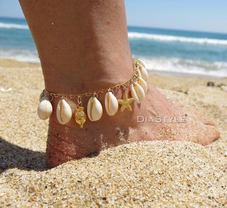 This beautiful beach dainty anklet or bracelet is made with cowrie shells, 24k gold plated brass pendants (seahourse, fish, starfish), 24k gold plated chain and 18k gold plated lobster clasp. An 1.5-inch extension chain is added to each bracelet. Your anklet or bracelet comes gift wrapped and shipped via priority registered air mail with tracking info available. Feel free to ask me any questions! Thanks for visiting and happy shopping :) Gold Starfish Shell For Beach, Gold Beachy Bracelets For Summer, Gold Shell For Beach Season, Gold Shell Necklace With Starfish Charm On Strand, Gold Shell With Starfish Charm For Beach, Gold Strand Anklets For Vacation, Gold Strand Shell For Vacation, Gold Shell Strand Bracelets, Gold Strand Bracelet With Ocean-inspired Style