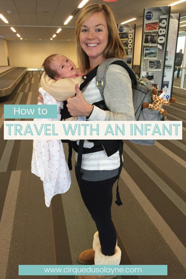 a woman holding a baby in her arms with the words how to travel with an infant