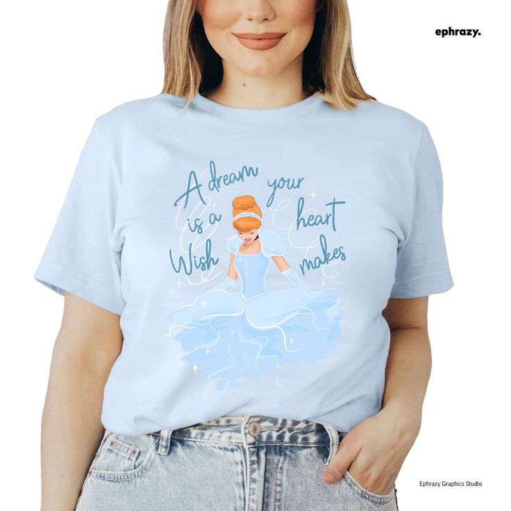 a woman wearing a t - shirt with an image of snow queen on it