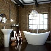 a large white bath tub sitting next to a window