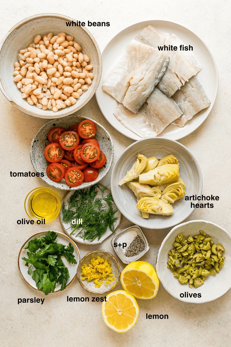 the ingredients for this recipe include fish, lemons, tomatoes, and beans