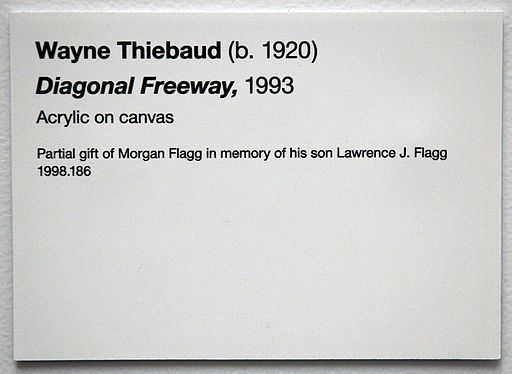 a white sign with black writing on it that says wayne thielaud b 1920 diagonal freeway, 1939 acrylic on canvas