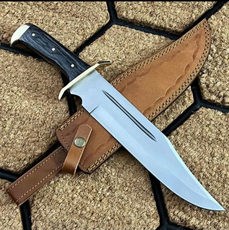 Big bowie knife available at Sharp edge cutlery company with leather sheath 
Handmade from 440 stainless steel and black dense wood handle Big Knife, D2 Steel, Dagger Knife, Cool Knives, Custom Knife, Bowie Knife, Handmade Knives, Hunting Knife, Leather Sheath