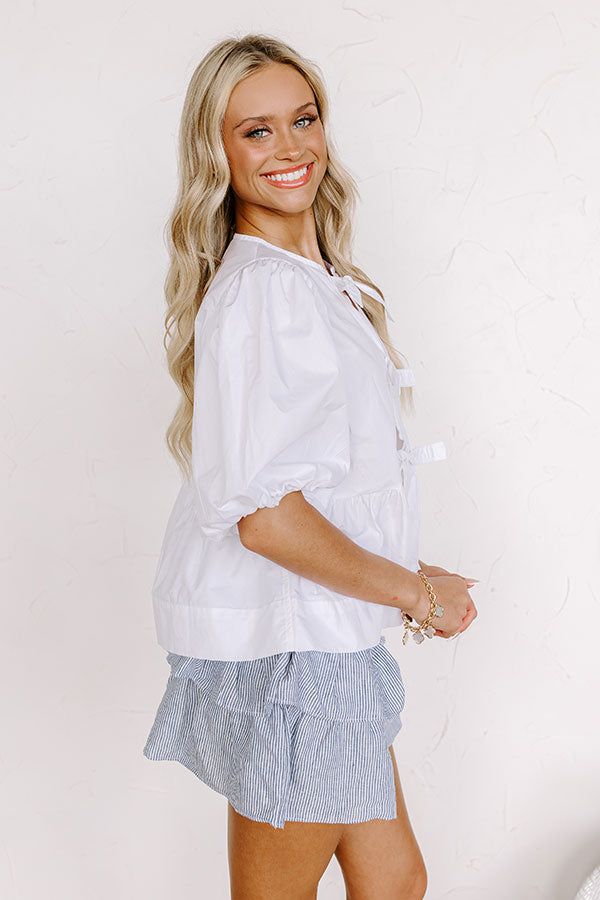 - This chic top is perfect for when you are feeling a bit flirty! - Unlined material - A crew cut neckline - Loose ¾ length sleeves with elastic cuffs - 3 ties at the front ending above the ruffled hemline - A relaxed silhouette that ends in a peplum hemline Chic Top, Crew Cuts, Tie Top, Front Tie Top, Length Sleeve, Sleeve Length, Luxury Fashion, Fashion Trends