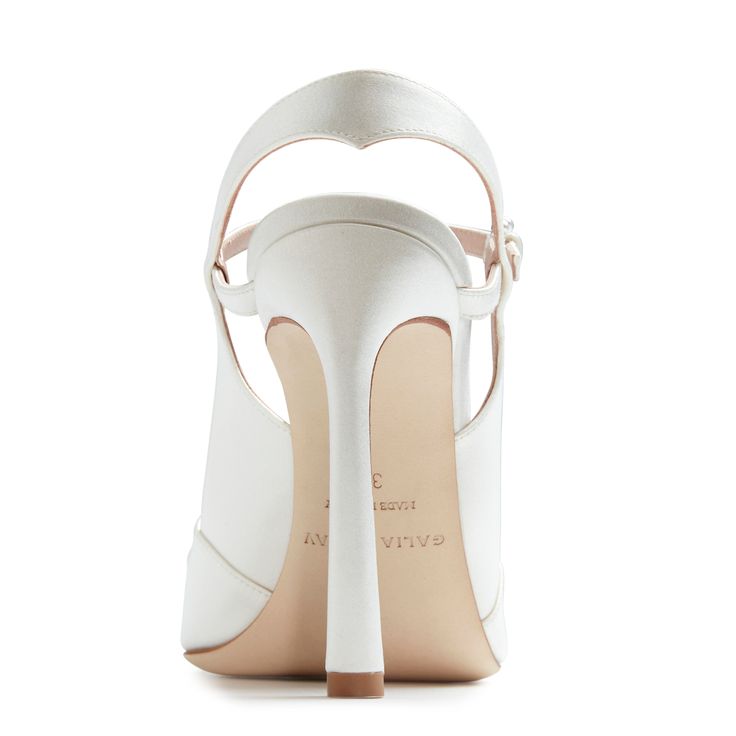 These pearl-bedecked slingback sandals in Silk Satin nod to a whimsical aesthetic. The open-toe 105mm heels feature a side buckle lined with small, dainty pearls and two larger ivory pearls to beautifully accentuate the toe. Galia Lahav Bridal, Whimsical Aesthetic, Veil Accessories, Fashion Gowns, Open Toe Heels, Buckled Heels, Slingback Sandals, Ivory Pearl, Slingback Sandal