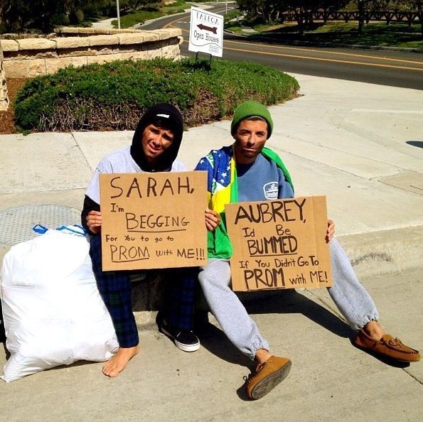 two people sitting on the sidewalk holding signs that say, sabrah to begin