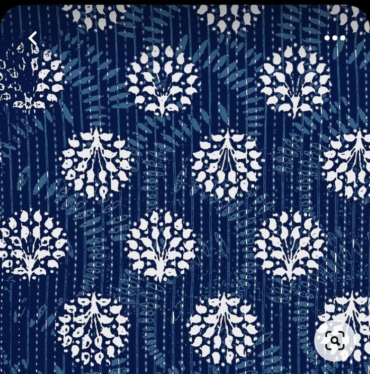 a blue and white floral pattern on fabric stock photo - 547982