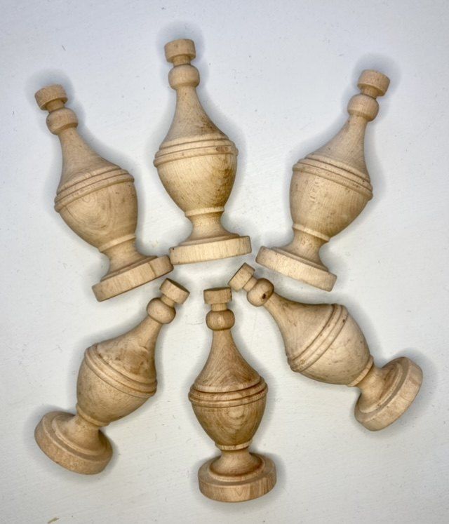 six wooden vases are arranged in the shape of an eight - pointed figure on a white background