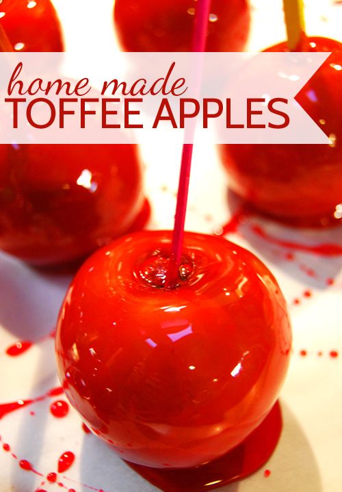 there are many red apples on top of each other with the words homemade toffee apples above them