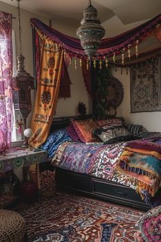 a bed room with a neatly made bed and lots of curtains on the windowsill