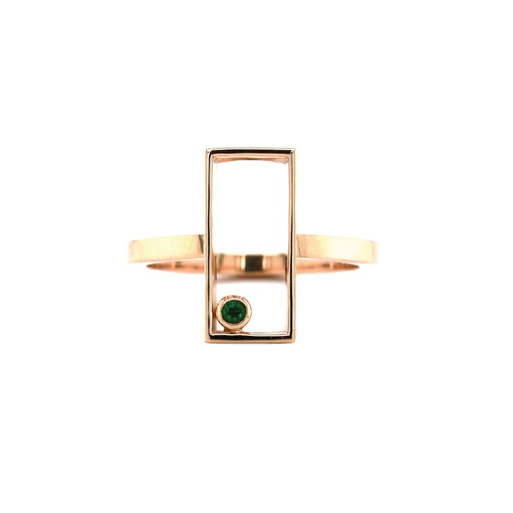 A dainty natural green 0.04ct round cut tsavorite gemstone is nestled within a rectangular negative space design. Set in completely recycled 14K yellow gold, the ring was designed and created in Seattle. In Swahili, Kanzi means "Treasure." This unique ring celebrates the value and versatility of open spaces. Bold, elegant geometry reflects the patterns found in nature to evoke a sense of hope and harmony with the earth. Available in a variety of ring sizes, precious metals and gemstones. Contact Modern Jewelry With Rectangular May Birthstone, Modern 14k Gold Open Emerald Ring, Modern Emerald May Birthstone Ring, Modern Rectangular May Birthstone Jewelry, Modern 14k Gold Emerald Ring For May Birthstone, Modern Formal Rectangular Emerald Ring, Modern Tsavorite Emerald Ring As Gift, Modern Emerald Ring With Rectangular Stone, Modern Open Emerald Ring With Birthstone