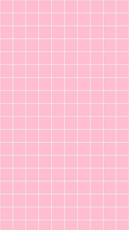 a pink tiled wall with white squares on it