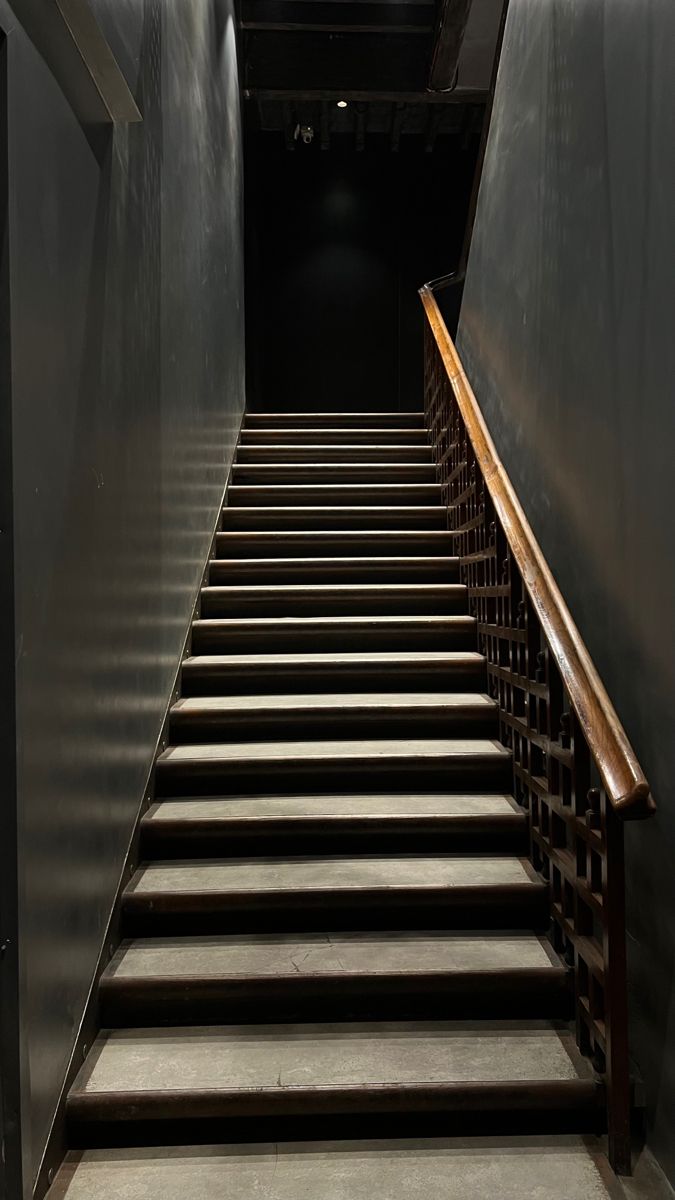 a set of stairs leading up to an empty room