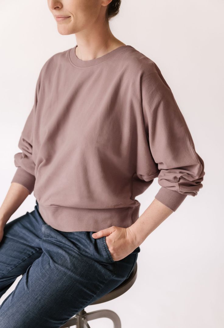 Our newest Womens Sweatshirt is a must-have for moms on the go! Made from 100% organic French Terry cotton, a soft plush texture you'll recognize from your comfiest loungewear, each piece of this collection is garment dyed for a vintage washed look and has the softest hand-feel. With wide, dolman-style sleeves and a relaxed fit, you will be comfortable on the move or taking much needed moments of relaxation. The ribbed trim at the neckline and cuffs adds the perfect finishing touch. Better yet, Veggie Patch, Organic Baby Clothes, Soft Hands, Rain Wear, Bottom Clothes, French Terry, Sweatshirts Women, Baby Clothes, Women Wear