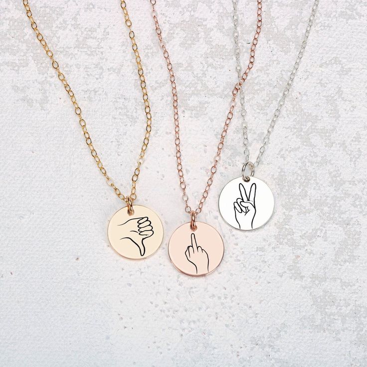 Treat your loved ones to something totally unique, totally creative, and totally YOU - the Hand Gestures Necklace. The perfect gift to let your friends and family know how much they truly mean to you! The coolest gift ever! Perfect for sharing your love with friends, sisters, and besties, our signature disc necklace features unique, hand-drawn expressions of sign language, designed by Melanie. Show your special someone just how much you care with a one-of-a-kind sign like 'I love you', 'peace', Elegant Engraved Charm Necklace For Best Friend, Engraved Pendant Charm Necklaces For Best Friend, Engraved Pendant Necklace For Friendship, Heart-shaped Engraved Charm Necklace For Best Friend, Personalized Heart-shaped Necklaces For Friendship, 20 Inch Necklace, Princess Necklace, Wear Necklaces, Month Gifts