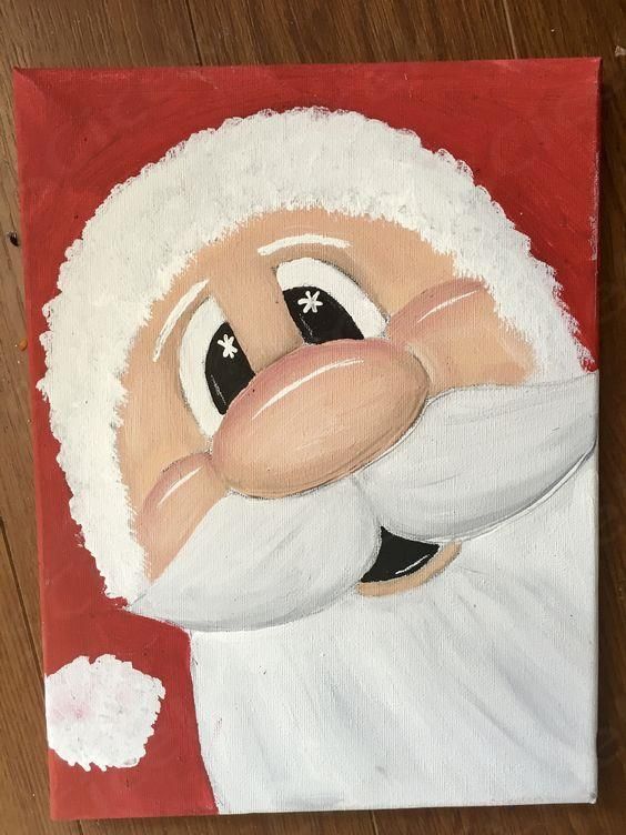 a painting of santa claus on a red and white canvas with wood flooring in the background