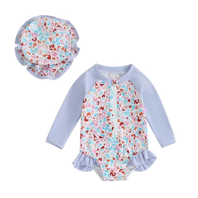 Get your little one ready for a summer of fun with the LYLA Ruffle Summer Outfit! This adorable long sleeve swimwear features playful ruffles and comes with a matching swim cap. Perfect for splashing in the pool or playing on the beach, this outfit is a must-have for any baby girl. Let the summer adventures begin!