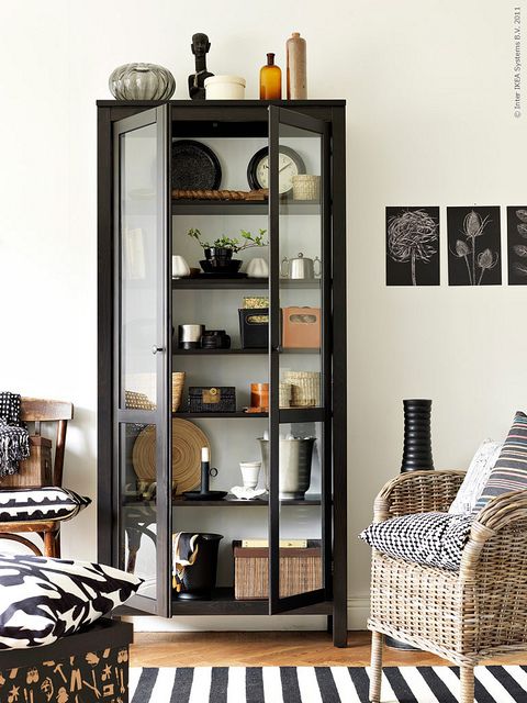 a living room filled with furniture and decor